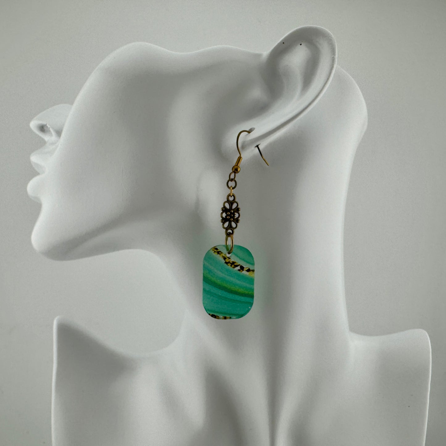 Boho Emerald Swirl Dangles – Translucent Acrylic with Vintage Bronze Details