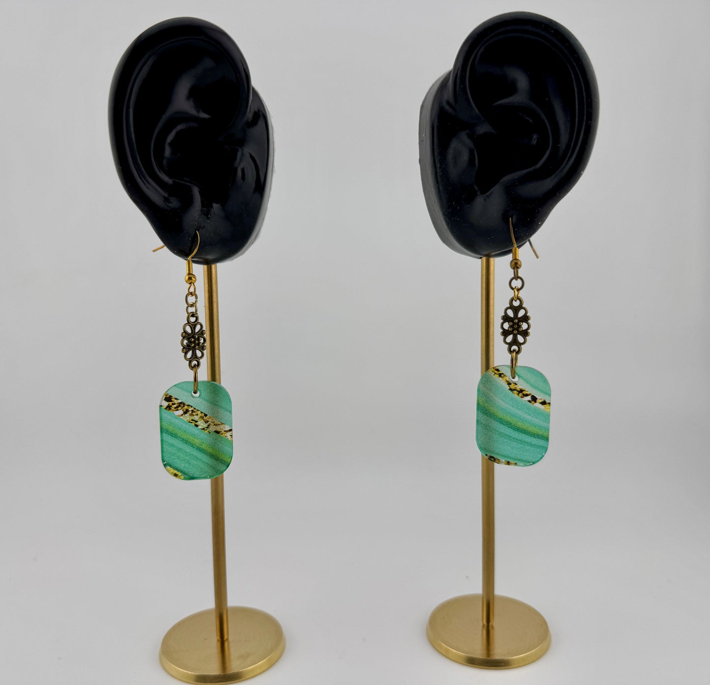 Boho Emerald Swirl Dangles – Translucent Acrylic with Vintage Bronze Details