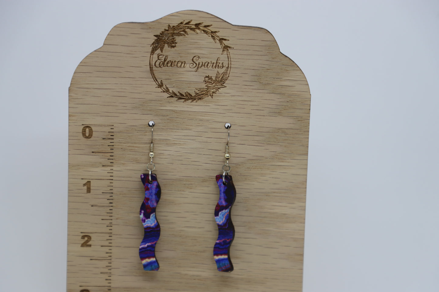 Purple gem wavy wood earrings