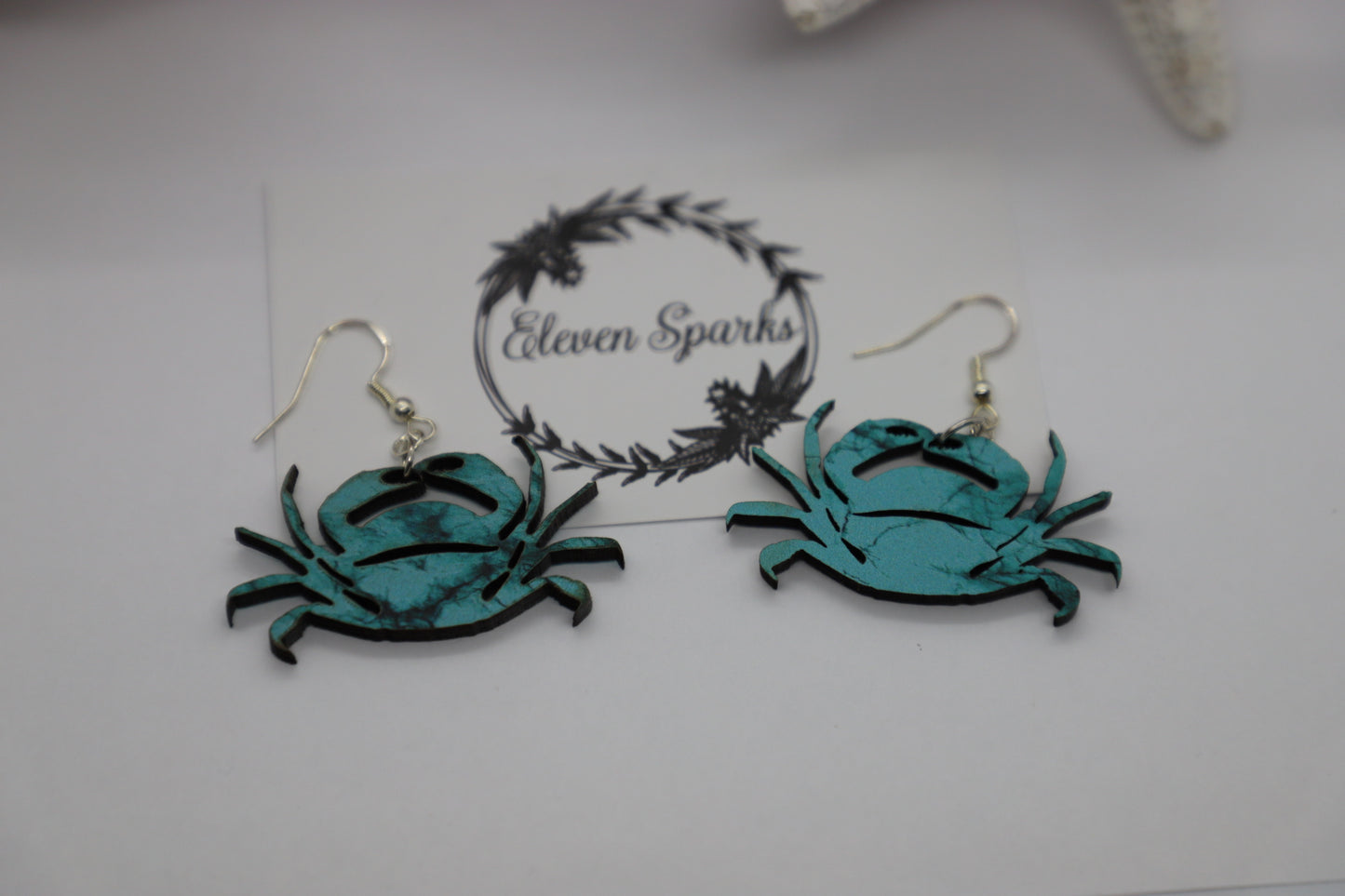 Blue green crab wood earrings