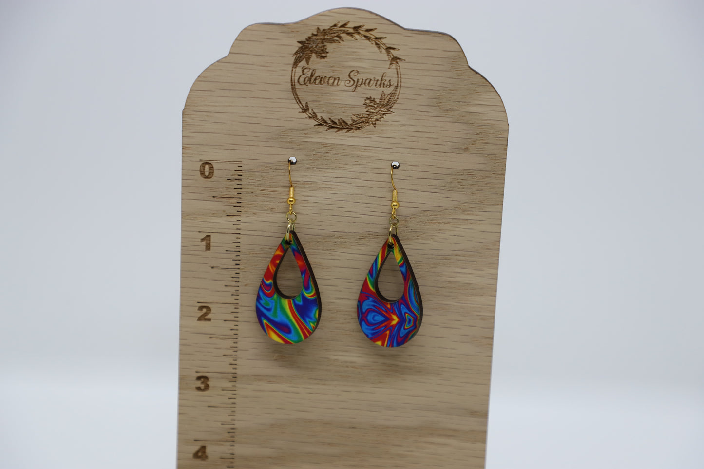 Groovy rainbow teardrop cutout wood earrings