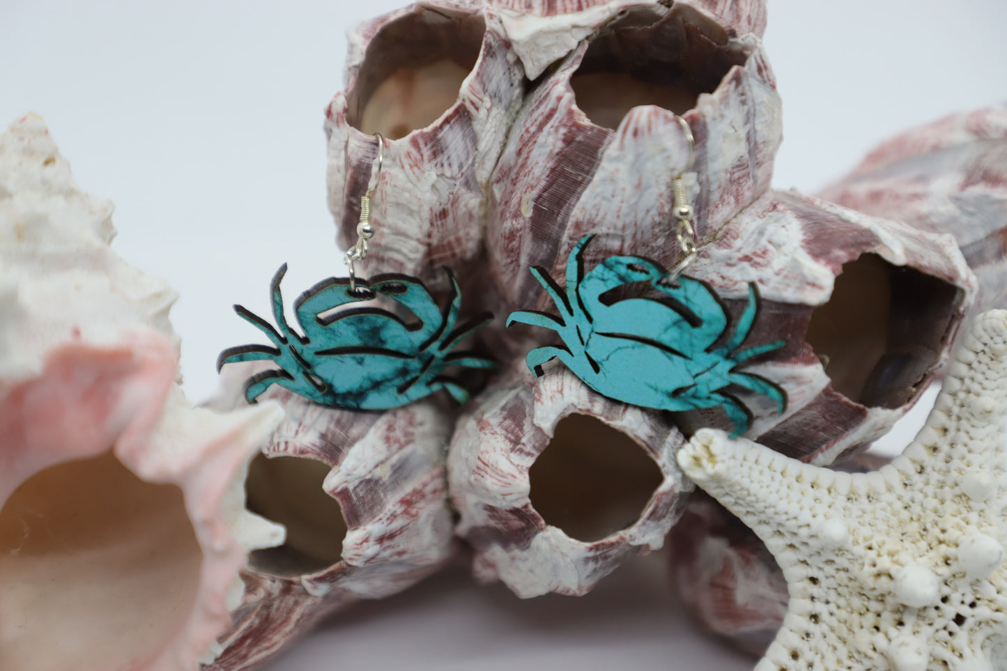 Blue green crab wood earrings