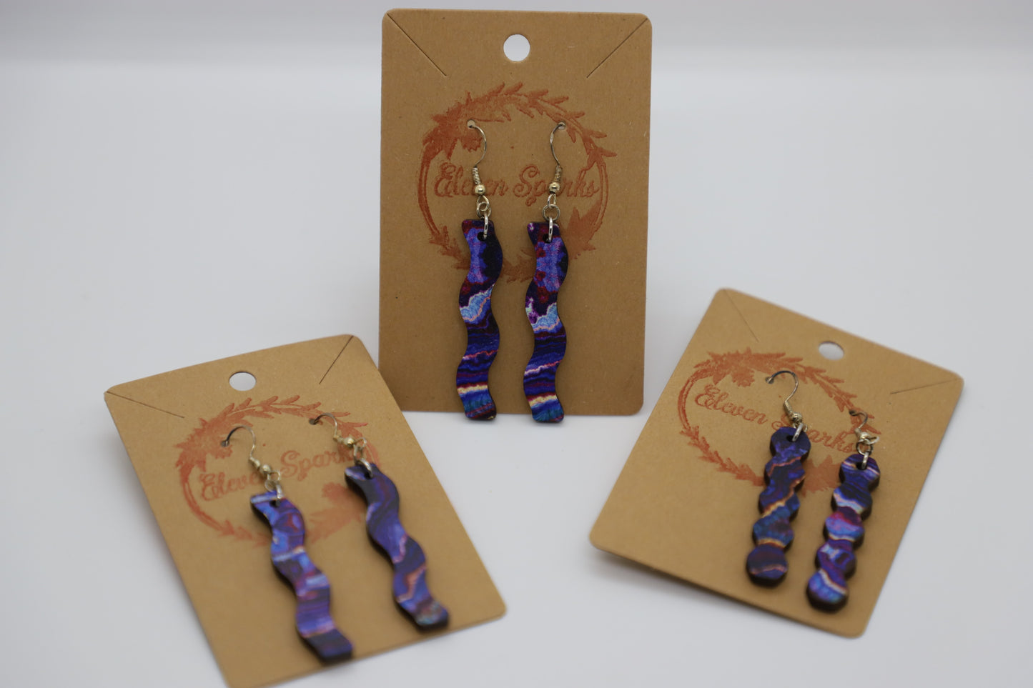 Purple gem wavy wood earrings
