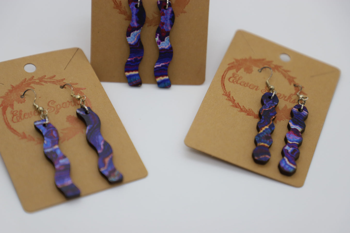 Purple gem wavy wood earrings